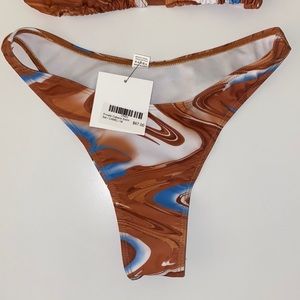 Swim suite! Brand new. Beautiful mix of colors.